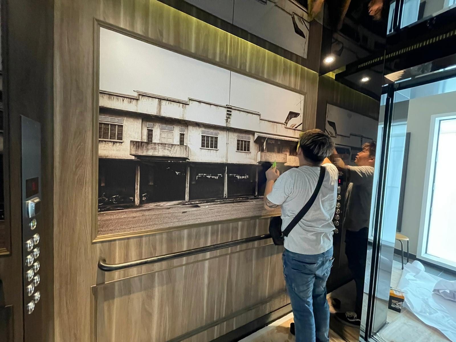 Shophouse canvas print being installed — Artist Canvas by Garrison Productions, Singapore