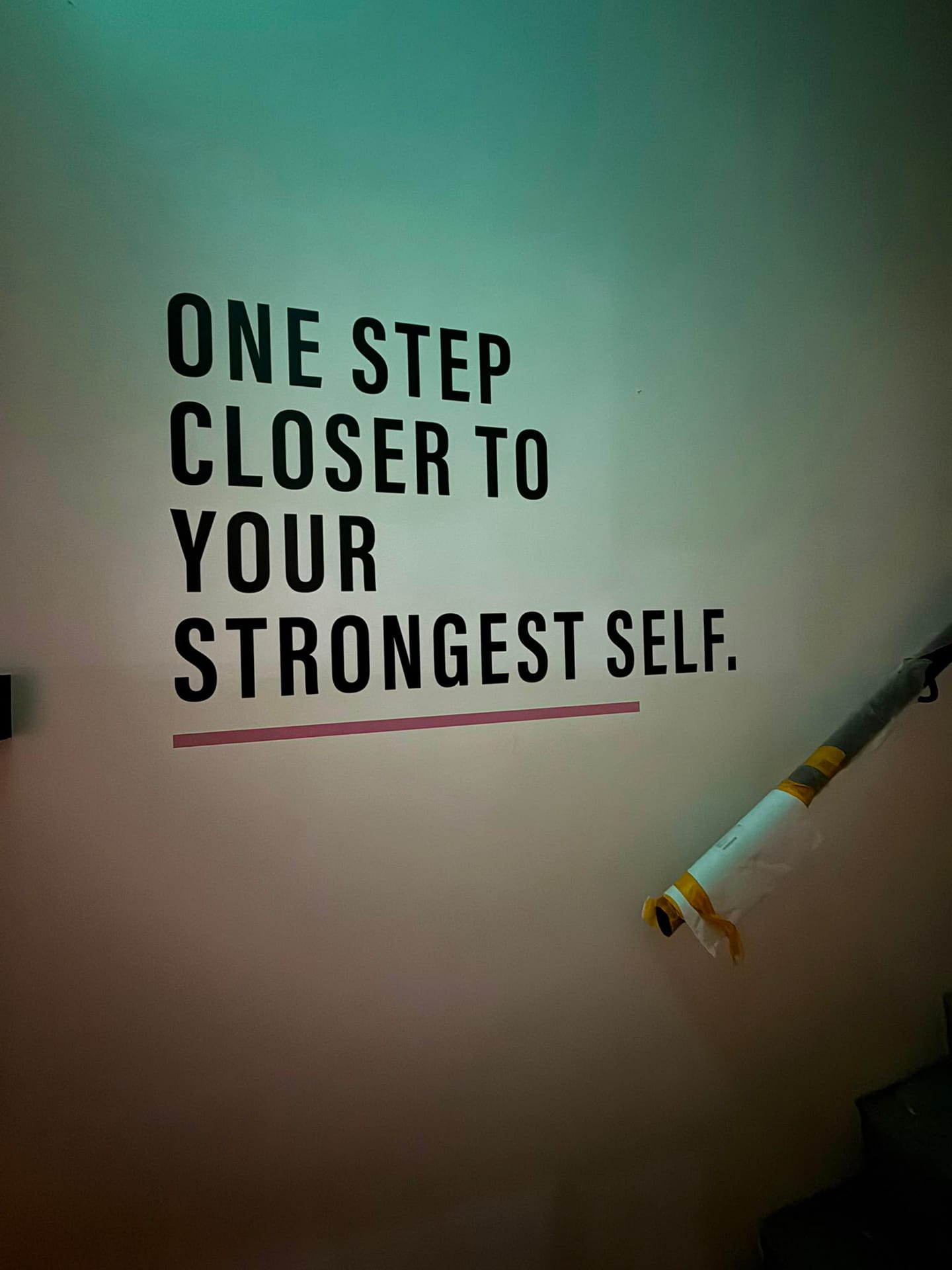 "One step closer to your strongest self" die-cut stair wall lettering — Die Cut Stickers by Garrison Productions, Singapore