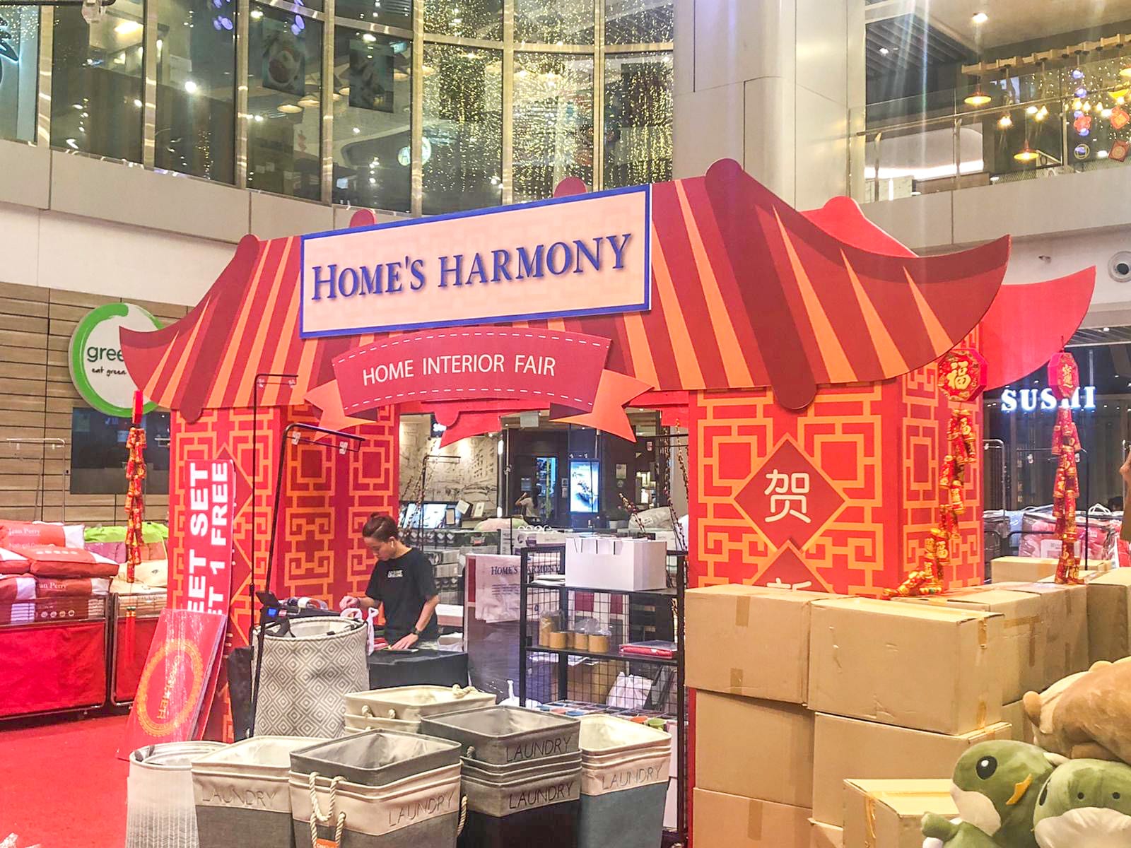 Home's Harmony red pavilion event booth in a mall — Event Backdrop by Garrison Productions, Singapore