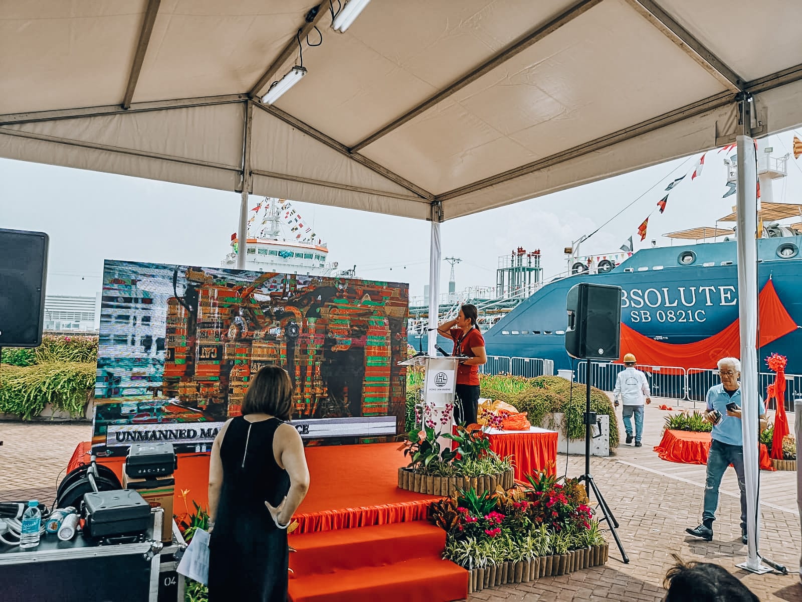 Outdoor event stage backdrop under a tent — Event Backdrop by Garrison Productions, Singapore