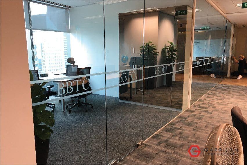 BBTC frosted film band on office glass — frosted glass sticker in Singapore by Garrison Productions