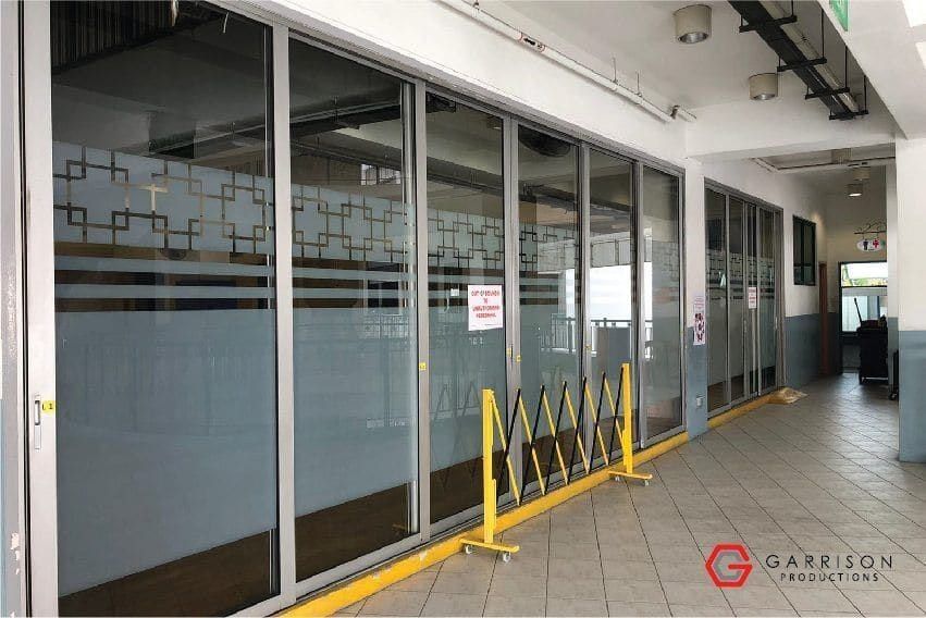 Frosted film along an office corridor — frosted sticker in Singapore by Garrison Productions