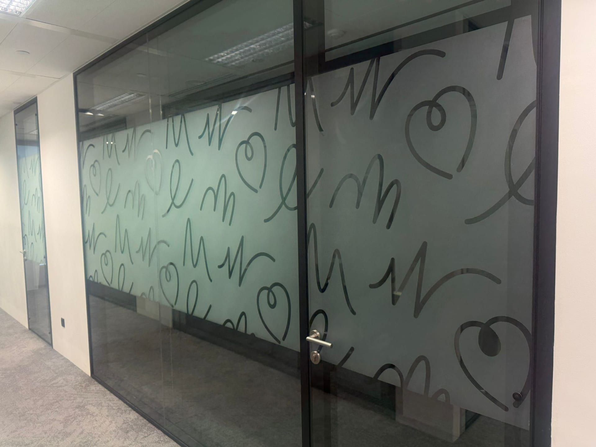Heart doodle frosted film on glass walls — Frosted Film by Garrison Productions, Singapore