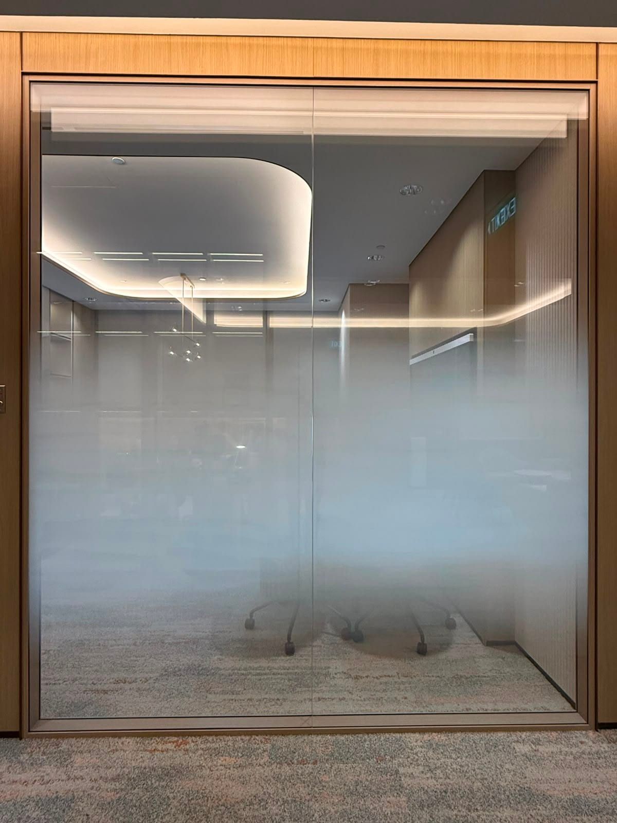 Gradient frosted film on glass panels — frosted window film in Singapore by Garrison Productions
