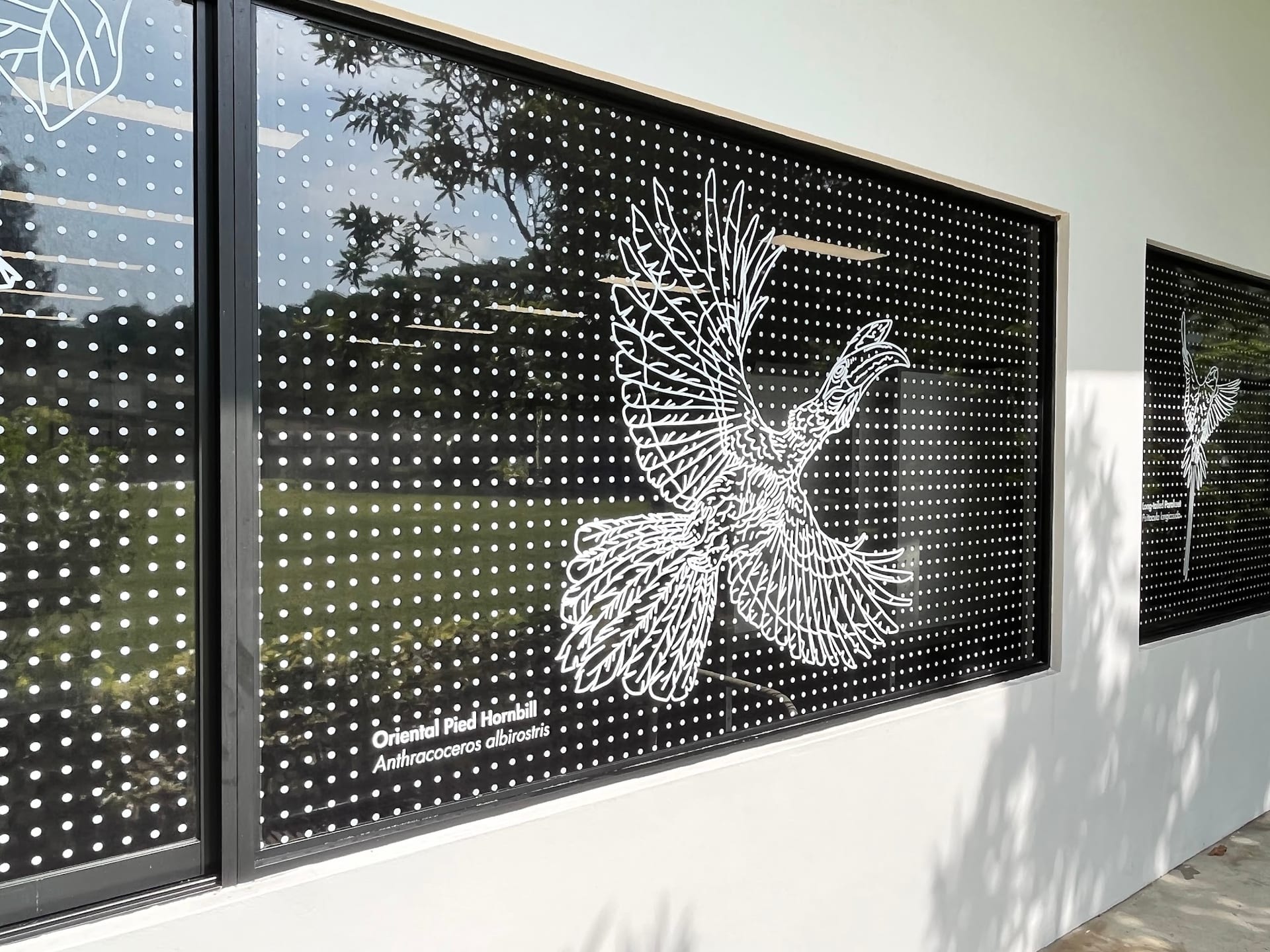 Cut-frosted eagle design on windows — frosted glass sticker in Singapore by Garrison Productions