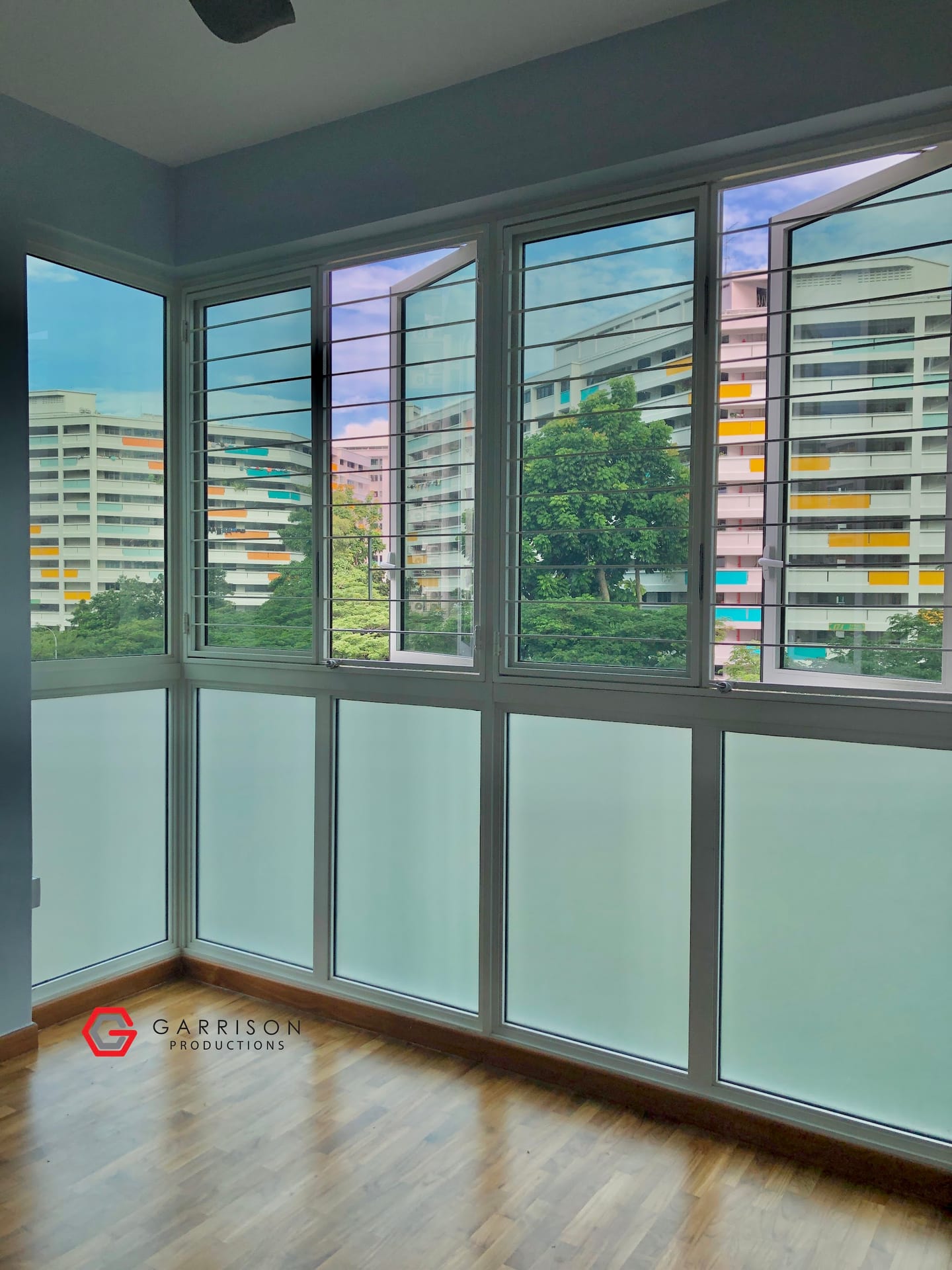 Frosted film on HDB bay windows — frosted glass sticker design in Singapore by Garrison Productions