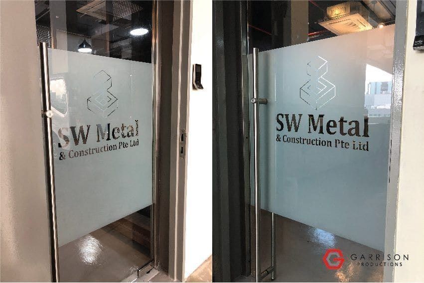 SW Metal logo frosted film on glass doors — frosted glass sticker design in Singapore by Garrison Productions