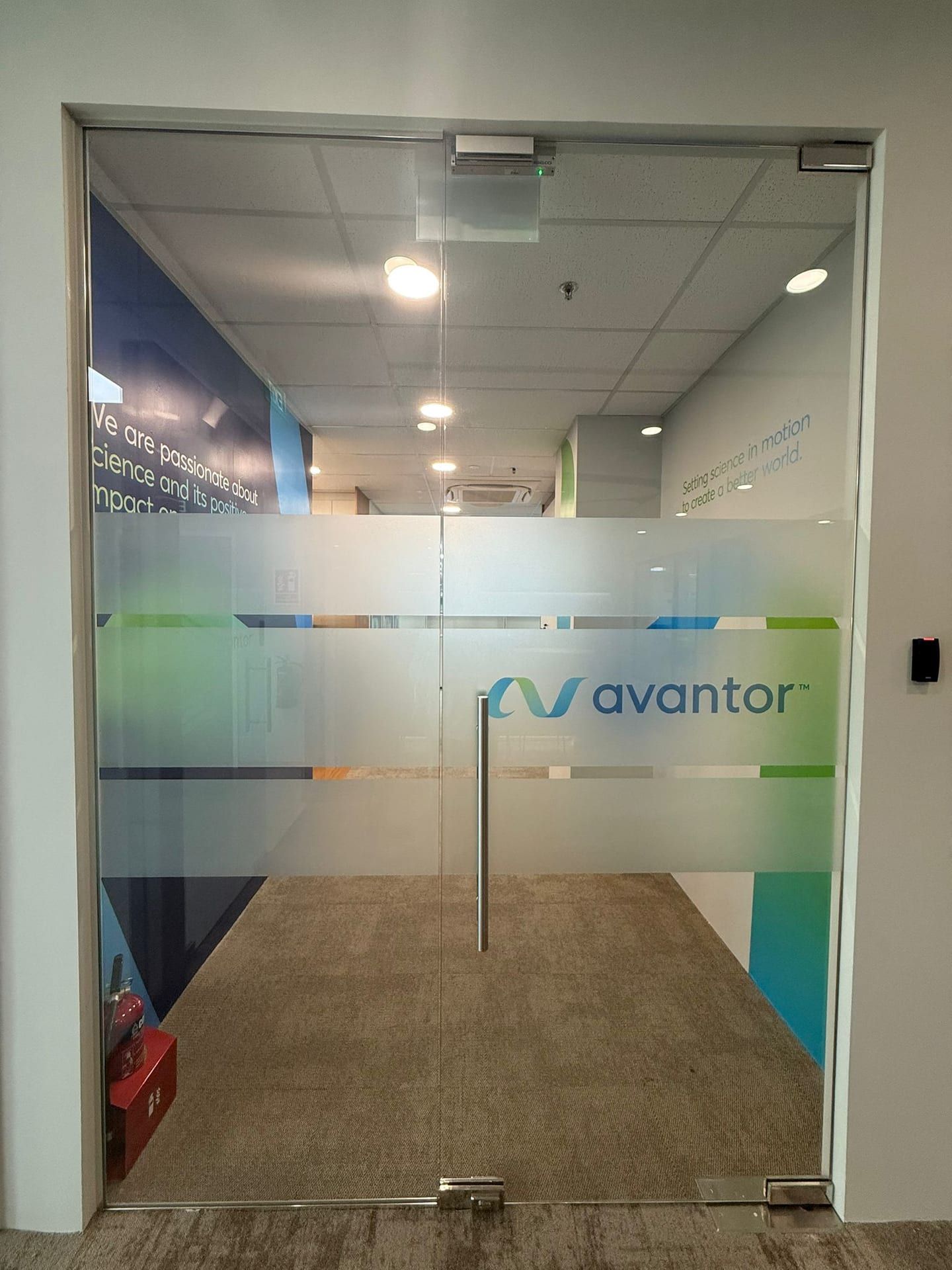Avantor frosted glass sticker on an office door — Glass Stickers by Garrison Productions, Singapore
