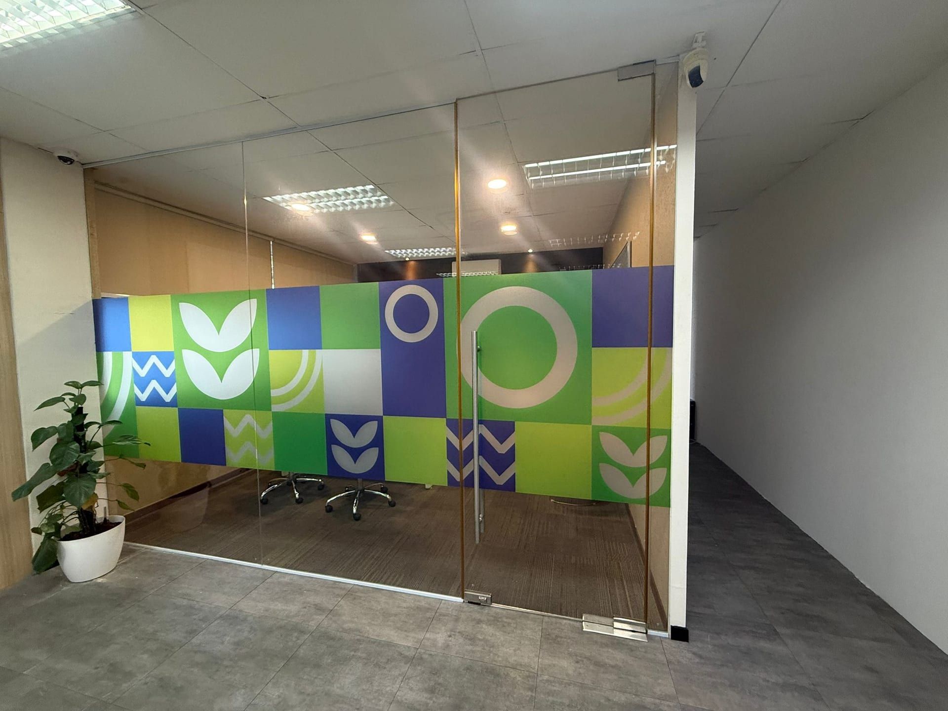 Geometric pattern glass stickers in a meeting room — Glass Stickers by Garrison Productions, Singapore