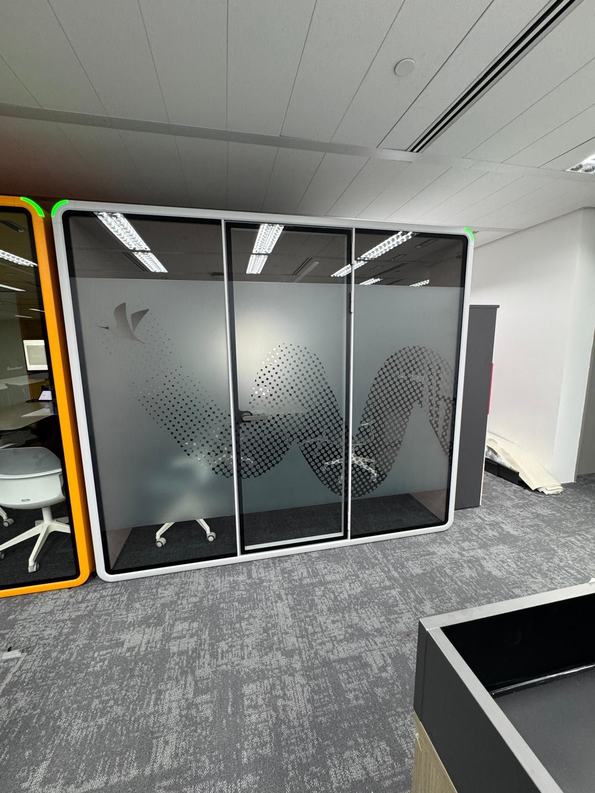 Frosted glass stickers on office meeting pods — glass sticker in Singapore by Garrison Productions