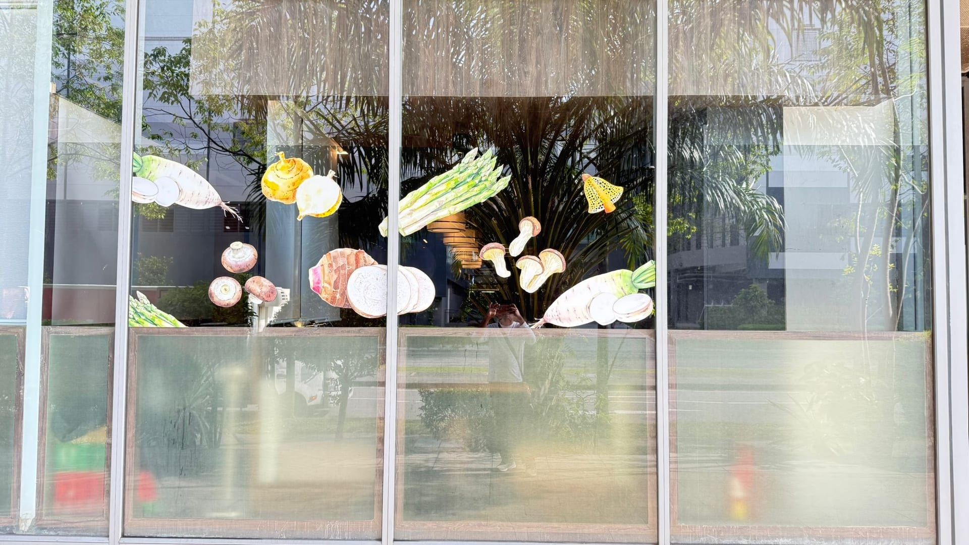 Food illustration glass stickers on a window — glass sticker printing in Singapore by Garrison Productions