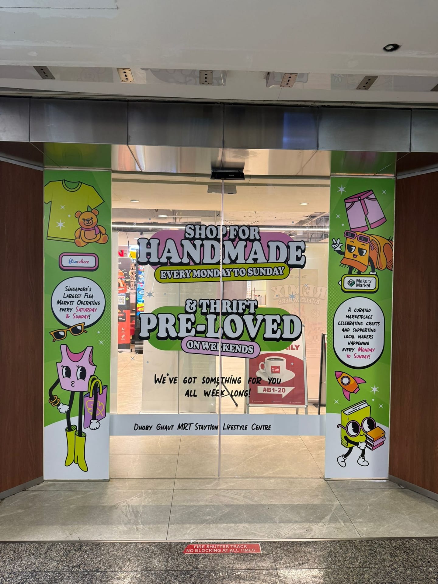 "Handmade, pre-loved" shop window glass stickers — glass stickers for windows in Singapore by Garrison Productions