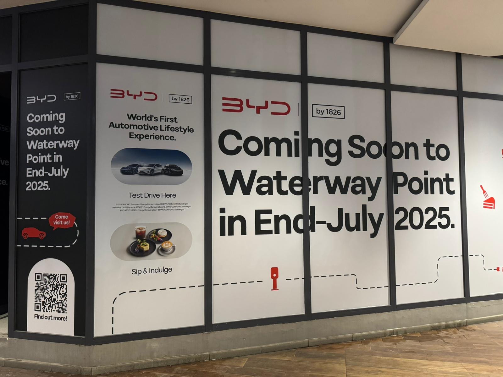 BYD "Coming soon to Waterway Point" glass panels — Glass Stickers by Garrison Productions, Singapore