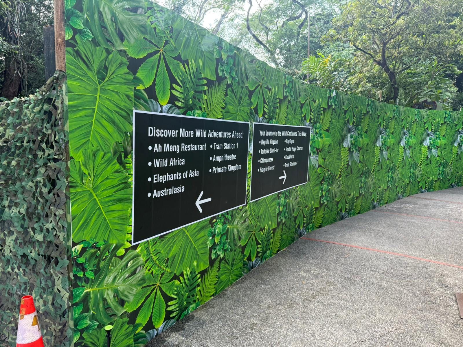 Mandai Wildlife Reserve hoarding with direction signs — Hoarding Sticker Printing by Garrison Productions, Singapore