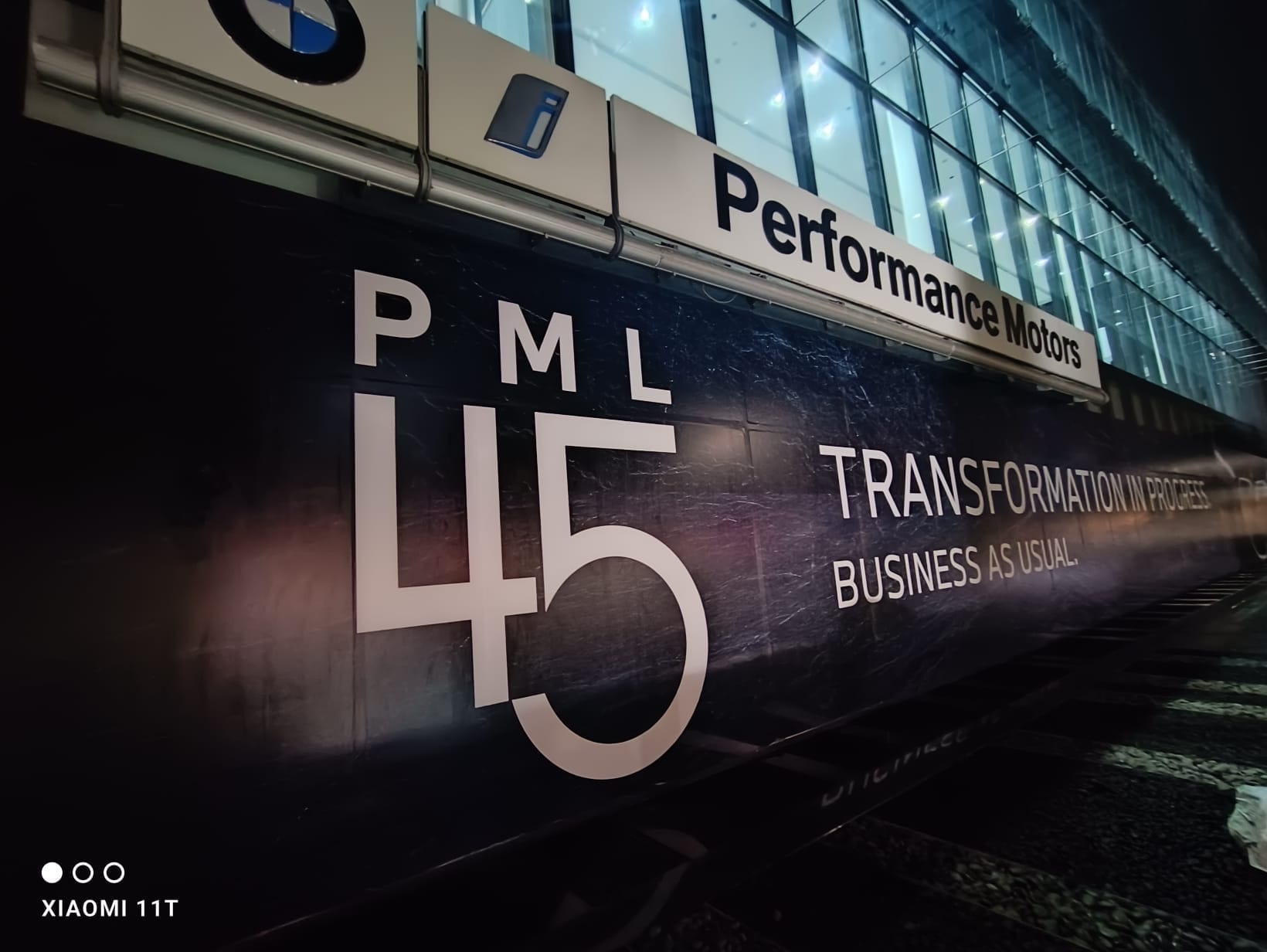 BMW Performance Motors PML 45 "Transformation in progress" hoarding at night — Hoarding Sticker Printing by Garrison Productions, Singapore