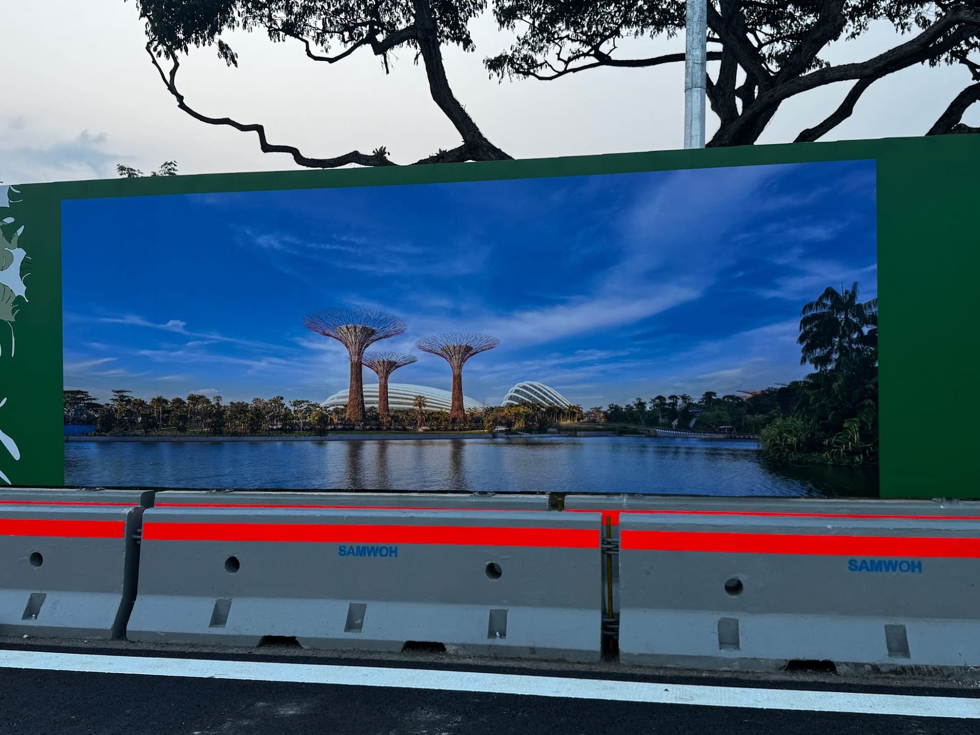 Gardens by the Bay scene on LTA roadside hoarding — Hoarding Sticker Printing by Garrison Productions, Singapore