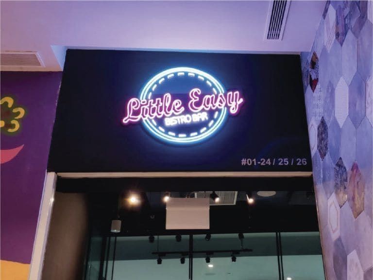 Little Easy neon sign above a bar — Neon Signs by Garrison Productions, Singapore