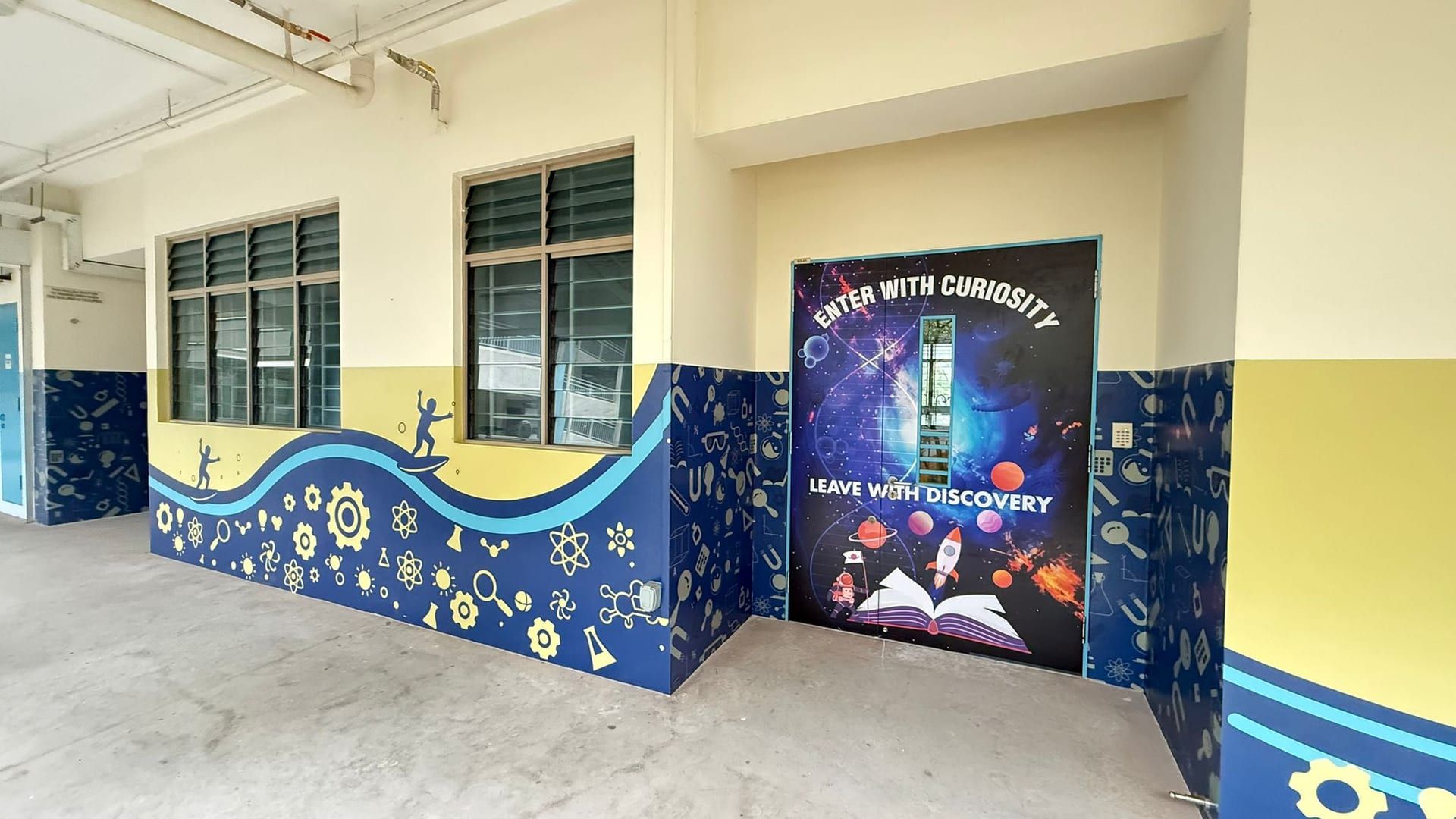 School wall mural with blue wave graphics — Wall Mural by Garrison Productions, Singapore