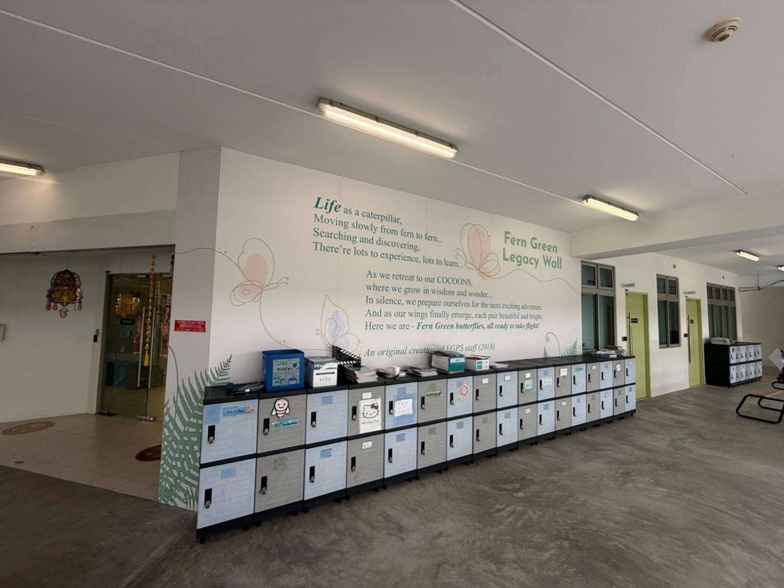 Fern Green quote wall mural above lockers — Wall Mural by Garrison Productions, Singapore